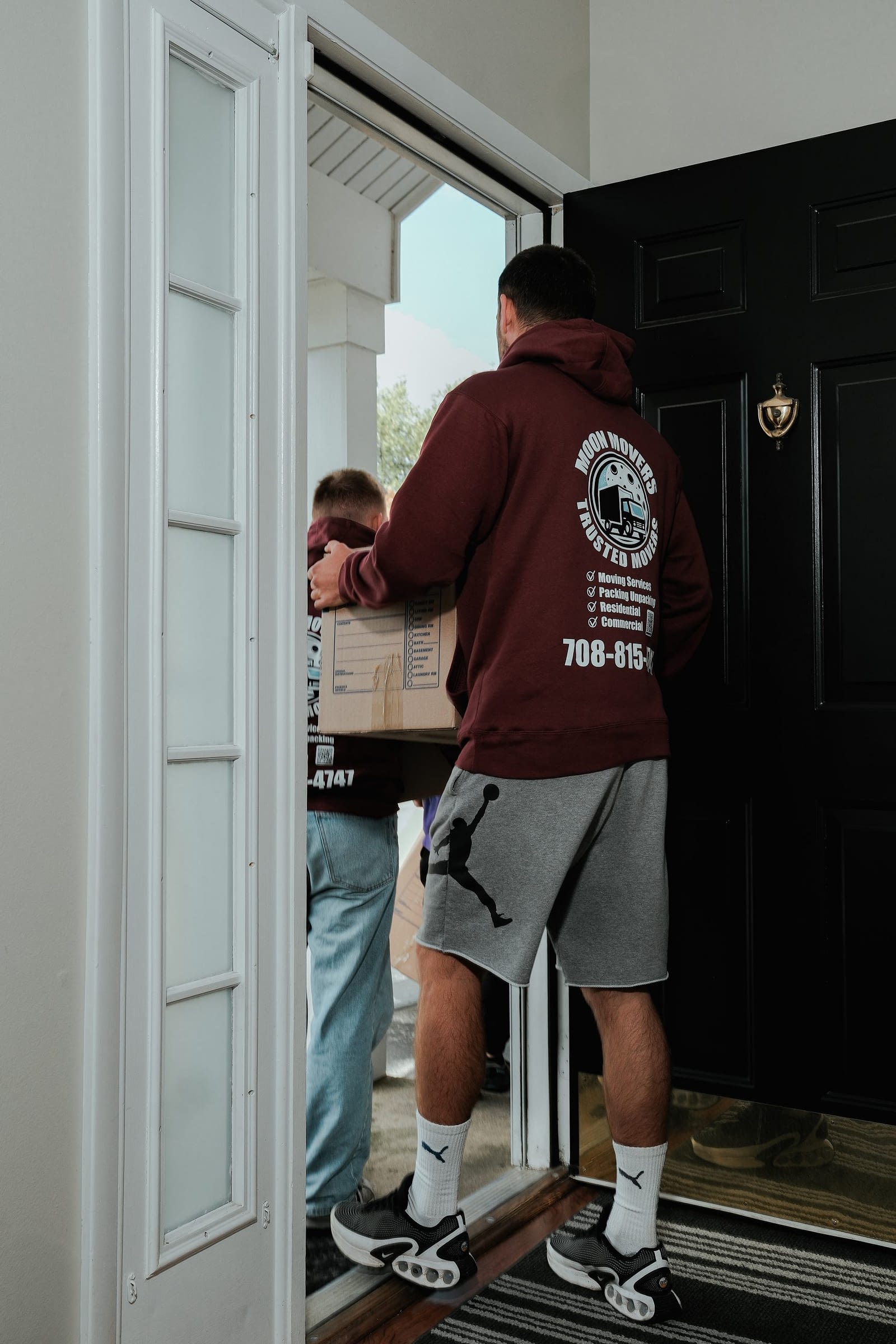 Moon Movers crew moving furniture